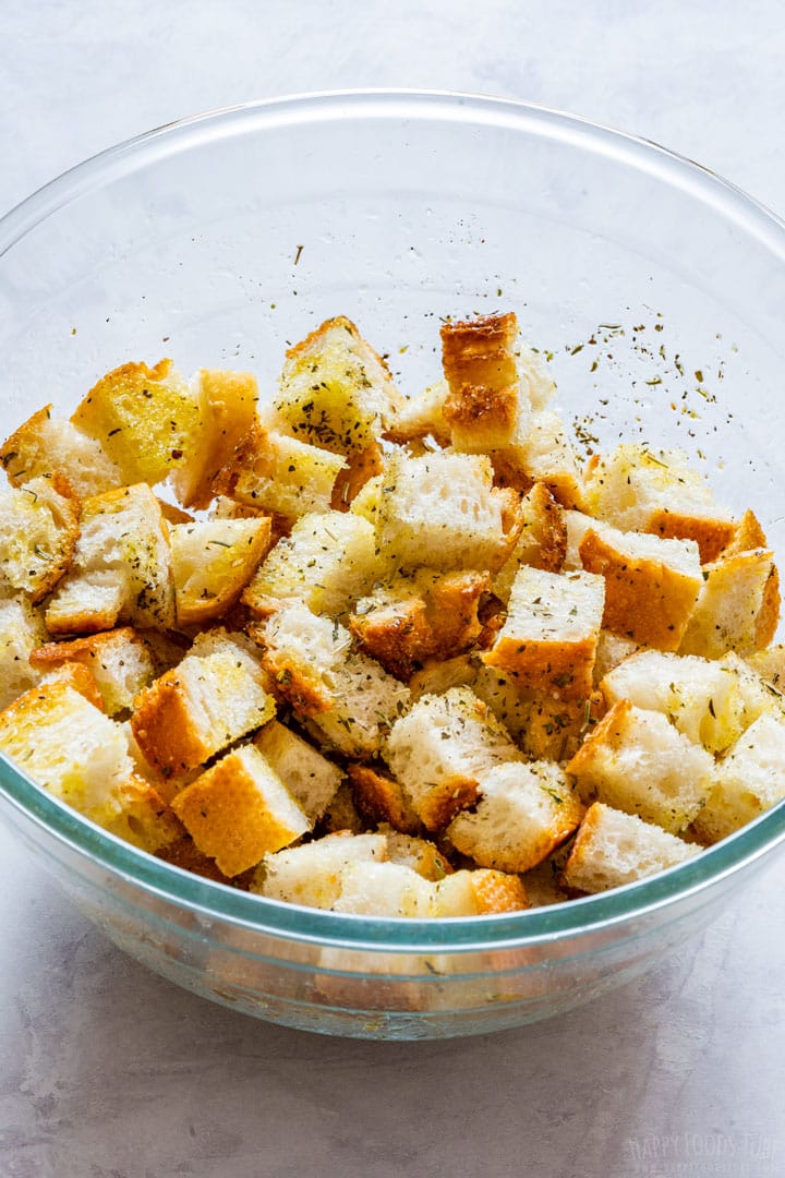 Baguette cut into cubes, drizzled with olive oil and seasoned.