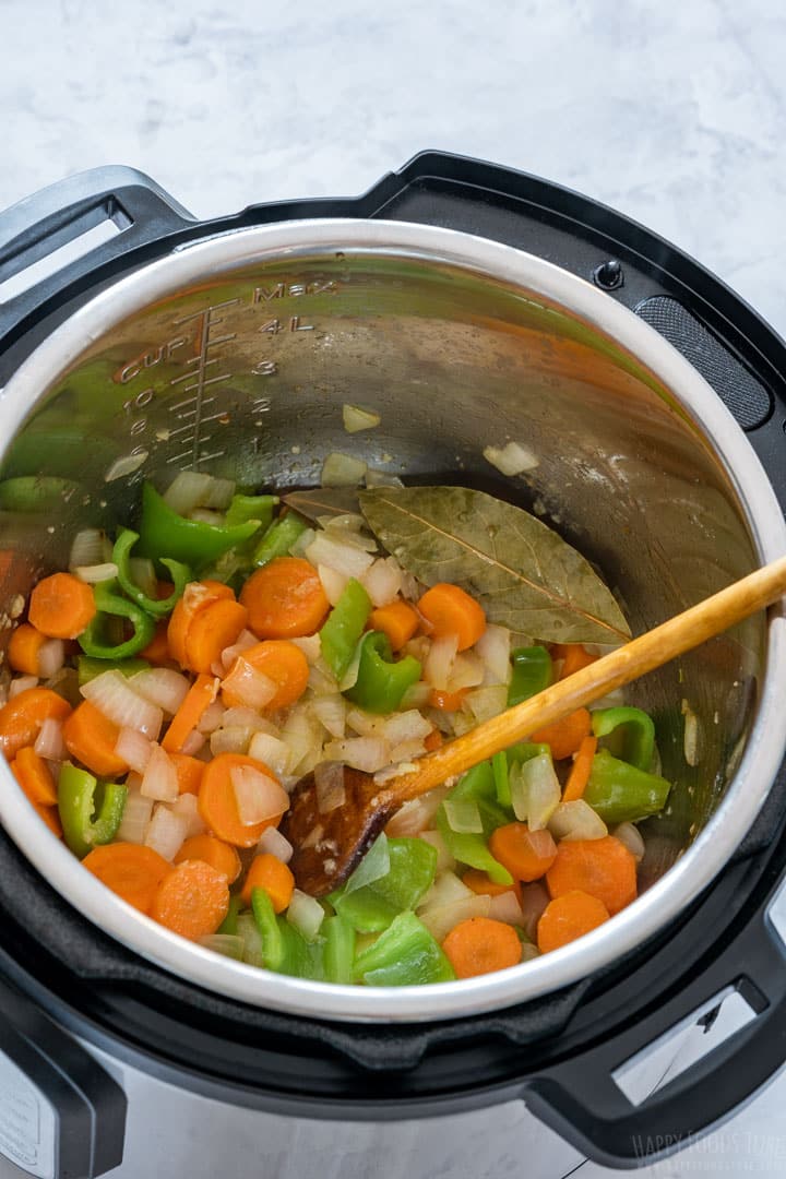 Sauteing onion, carrots, pepper and garlic.