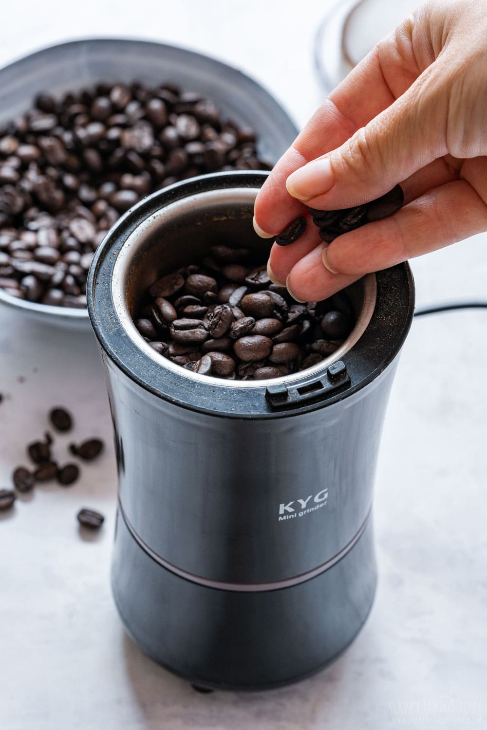 Grinding coffee beans.