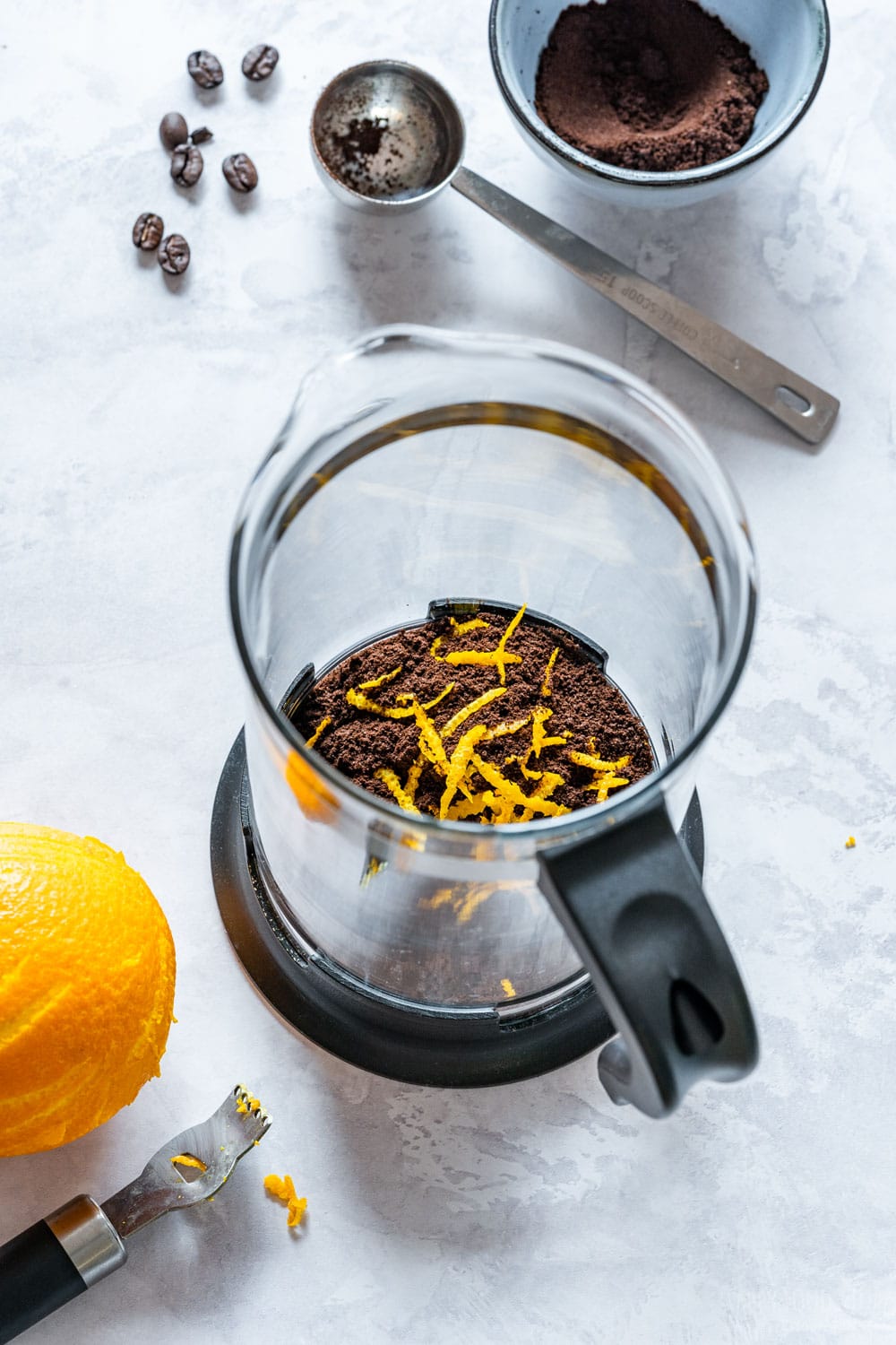Orange zest and coffee in the French press.