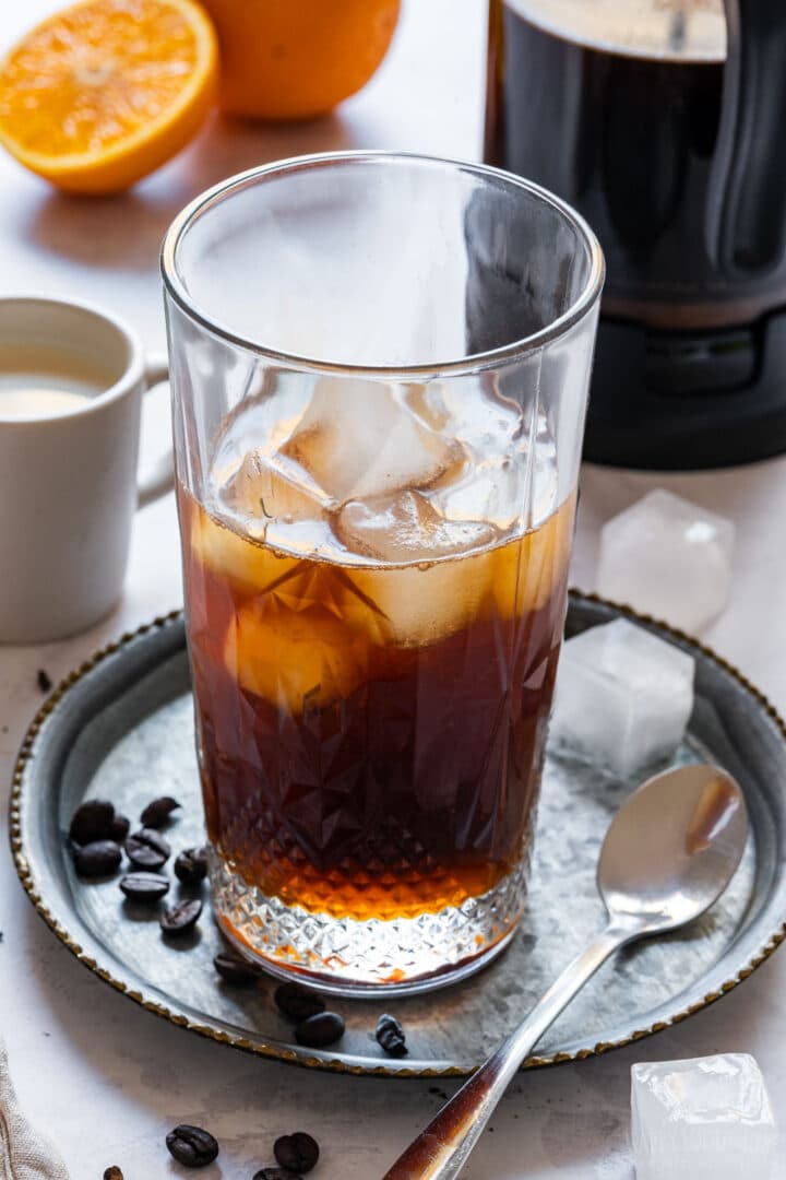 Closeup of orange cold brew coffee.