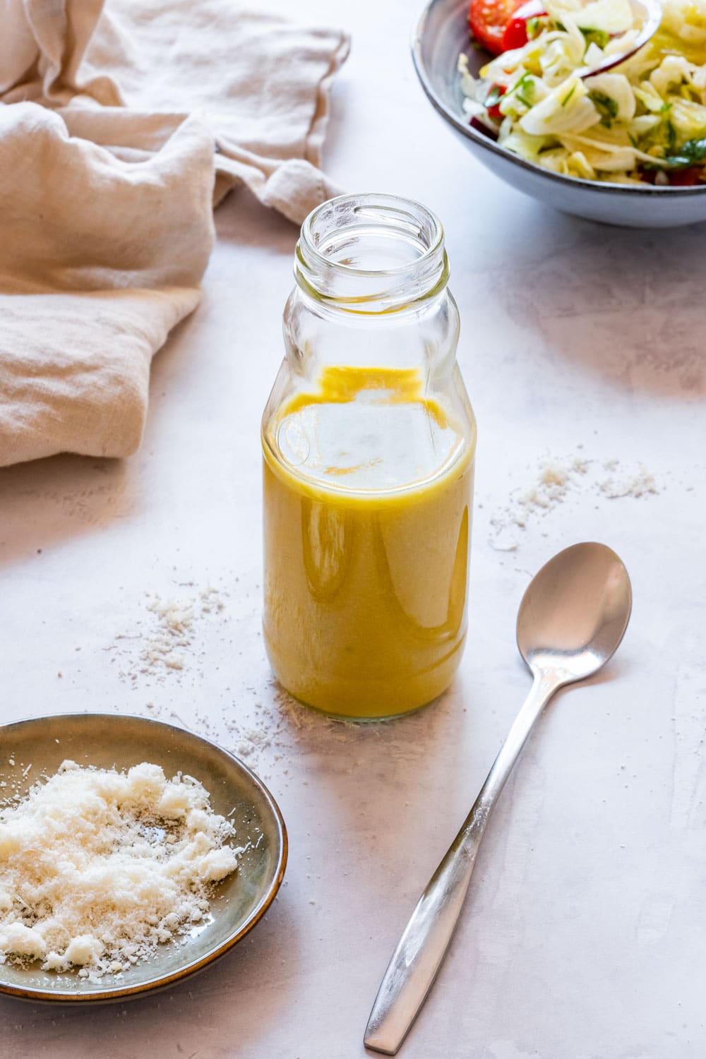 Bottle of homemade parmesan vinaigrette.