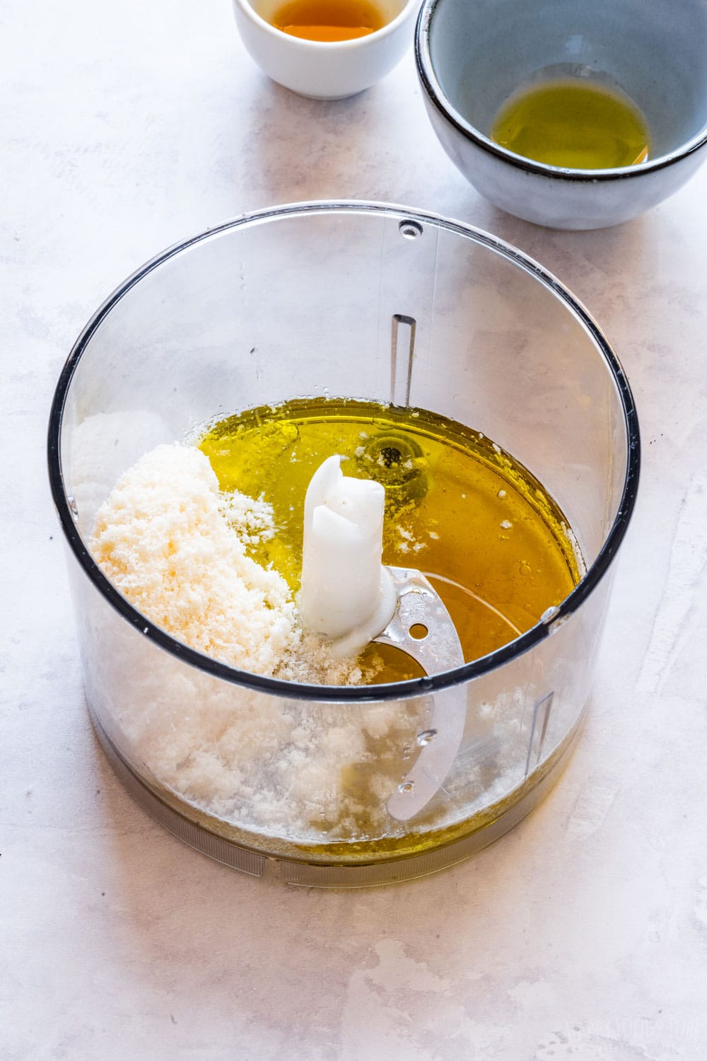 Parmesan, olive oil, honey and vinegar in the blender container.