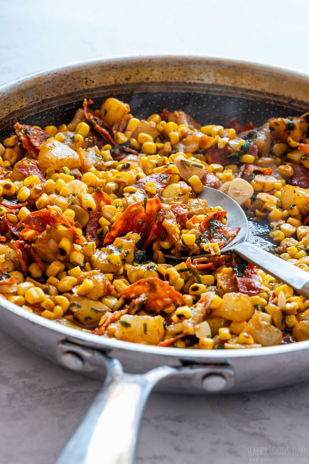 Corn, pears and chorizo on the skillet.
