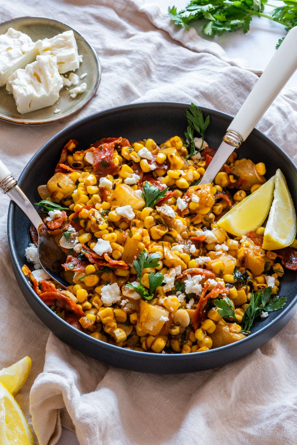 Grilled corn salad with feta cheese and chorizo.