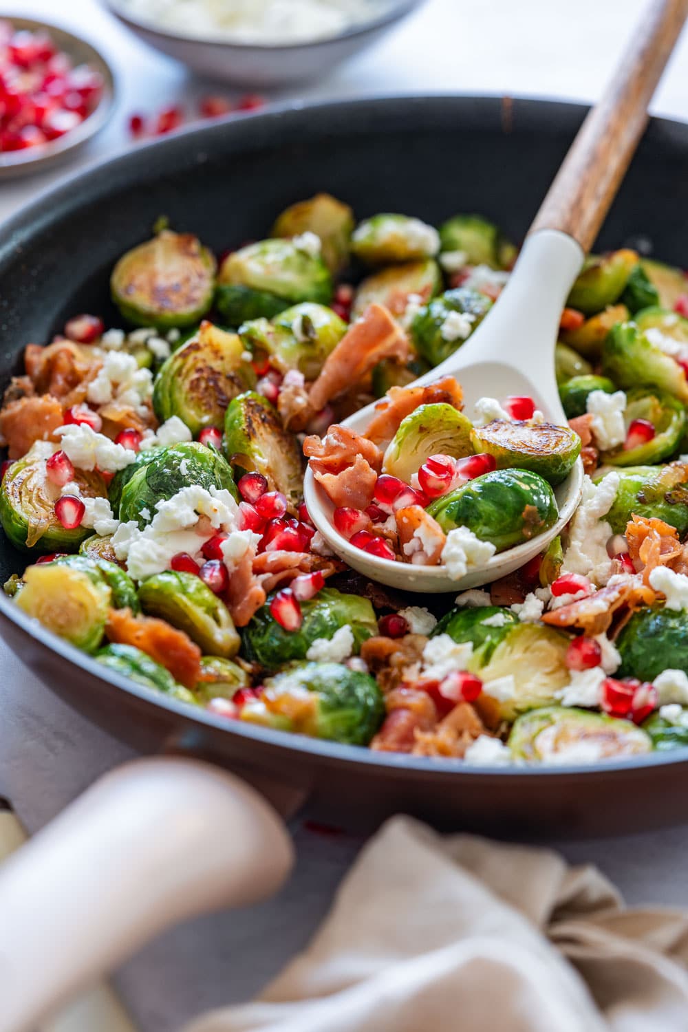 Roasted Brussels sprouts salad with prosciutto and pomegranate.