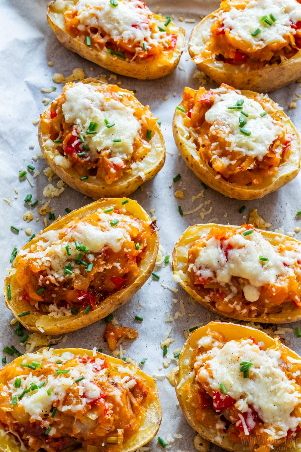 Double baked and stuffed potatoes topped with cheese and fresh chives.