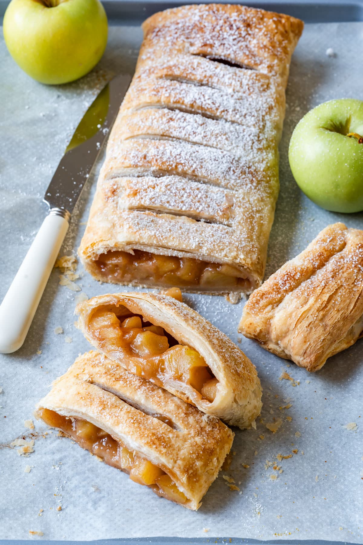 Flaky puff pastry apple strudel filled with homemade apple pie filling.