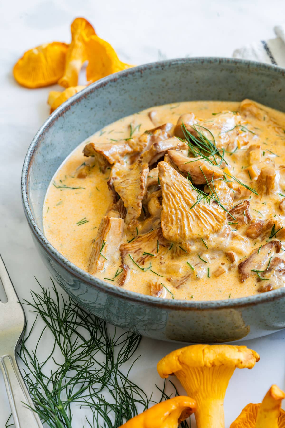 Creamy Chanterelle mushroom sauce in a bowl.