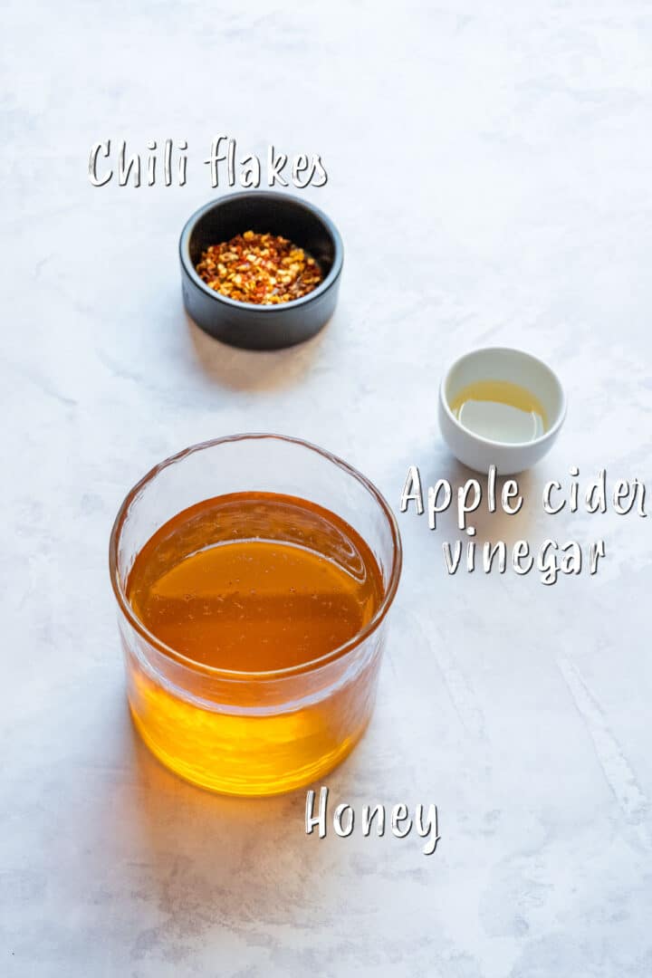 Ingredients for hot honey: honey, chili flakes and apple cider vinegar.