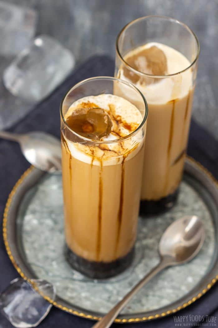 Iced caramel latte made with instant coffee, whole milk and caramel sauce. No espresso machine needed. Shake it in a jar, pour over large ice cubes and adjust the caramel to taste.