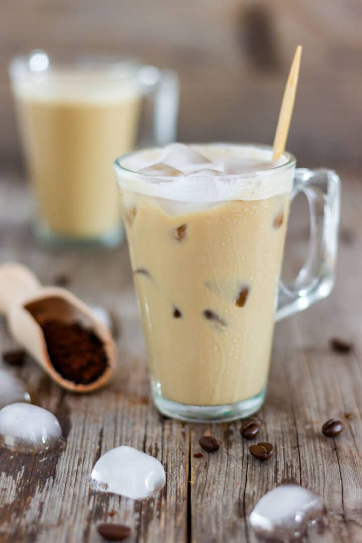 Make this 1-minute instant iced coffee with milk, water, brown sugar and ice. No brewing or cooling needed. Blend until smooth and lightly foamy, or shake it in a jar for a quick no-blender version.