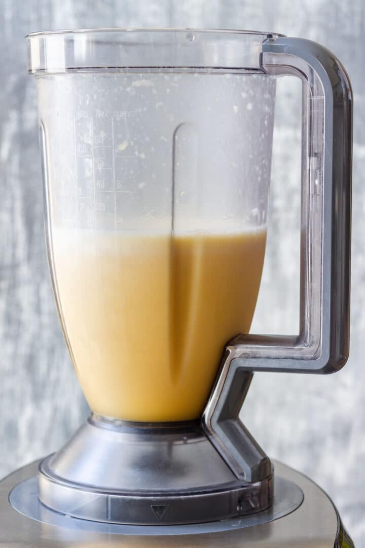 Blended Orange Julius in the blender, ready to pour.