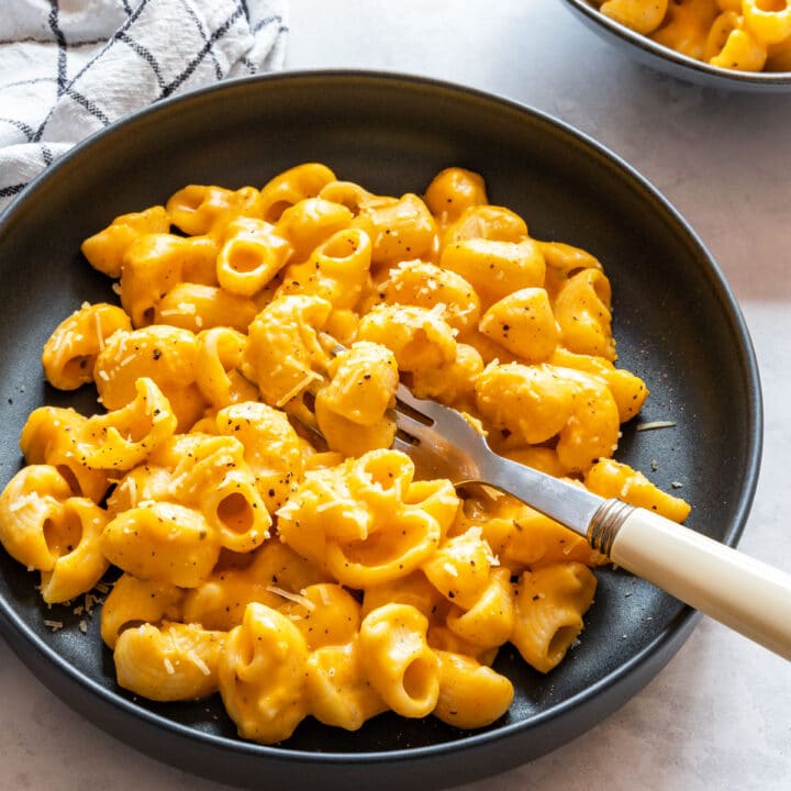 Sweet potato mac and cheese with a smooth, creamy orange sauce.