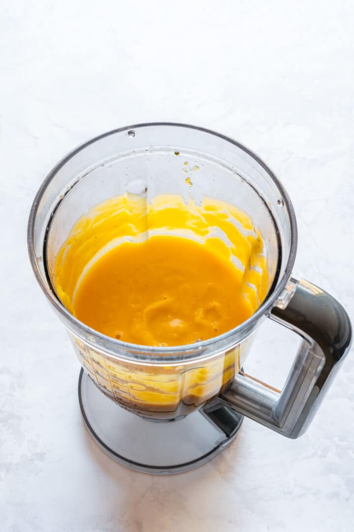 Smooth blended squash sauce in a blender.